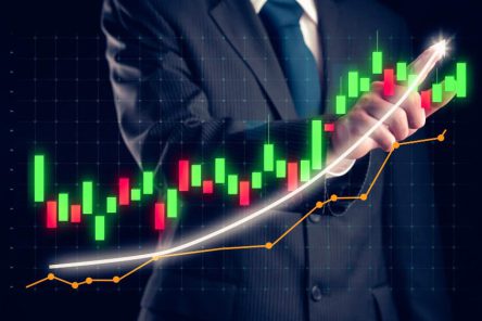 businessman-draw-finance-allusive-graph-chart-showing-business-profit-growth (1)