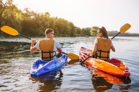 couple-together-kayaking-river (1)