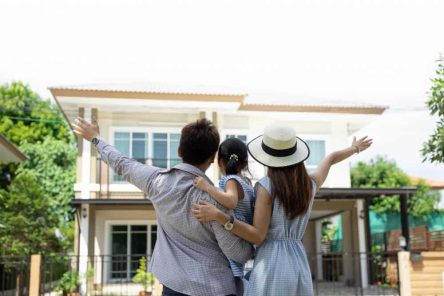 happy-asian-family-father-mother-daughter-near-new-home-real-estate (1)