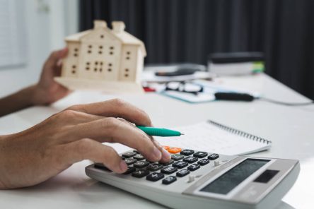 young-business-man-doing-calculator-finance-cost-home-office (1)